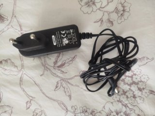 Adaptador de Corriente Amigo.