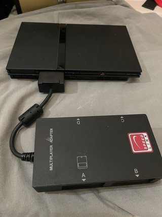 Consola Sony PS2 Negra y Adaptador Multi Player