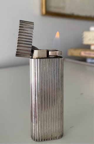 Mechero Cartier Godron chapado en plata. 1970.