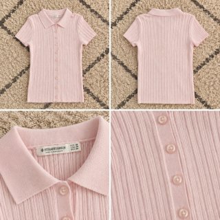 Top Stradivarius rosa canalé