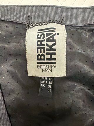 Chaleco Bershka gris y negro Talla M-L