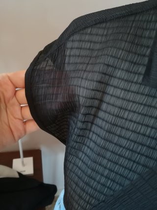 Blusa Camomilla nera con fiocco