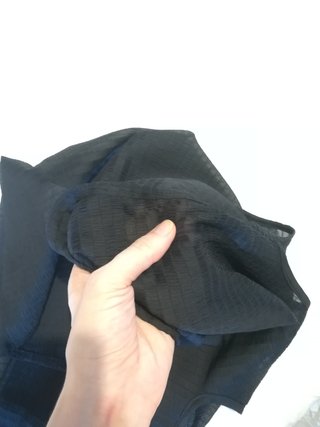 Blusa Camomilla nera con fiocco