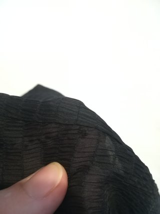 Blusa Camomilla nera con fiocco