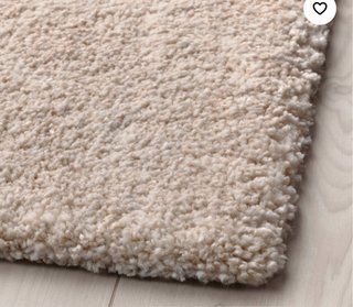 Alfombra beige casi nueva