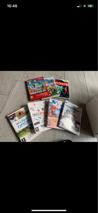 Nintendo Wii + Wii Fit + 2 mandos + juegos
