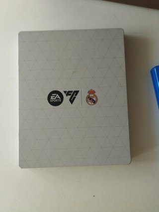 EA Sports FC 25 para PS4 con caja del real madrid