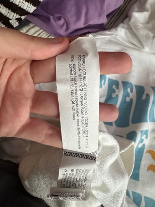 Sudadera blanca con sol sonriente