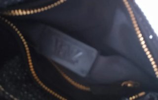 Bolso Zara negro apliques brillantes cadena dorada