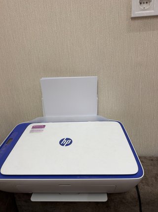 Impresora HP azul y blanca