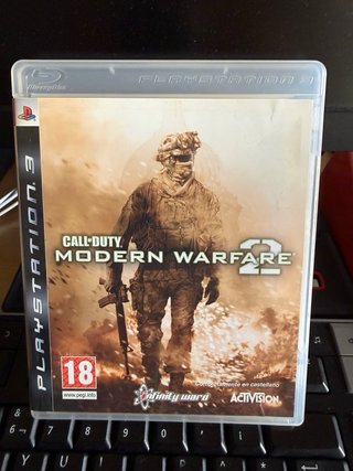 Consola PlayStation 3 (PS3) con mando y juegos