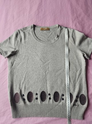 Jersey de la marca Naulover, en punto color tierra