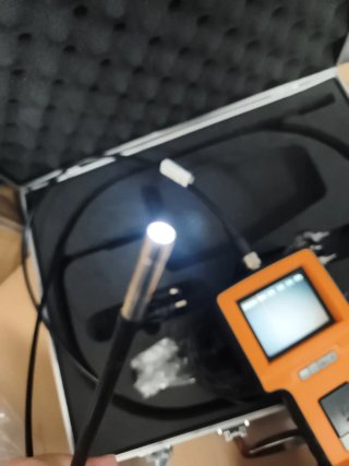 Máquina con cámara y accesorios (W697)