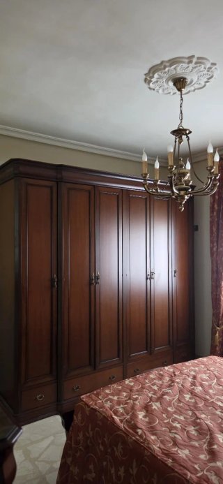 Dormitorio Clásico de Madera