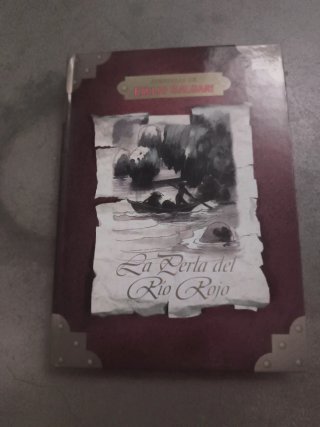 Libro de Emilio salgari, la perla del río rojo