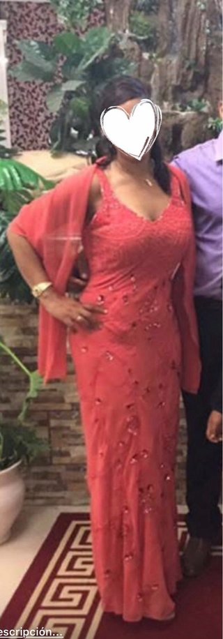 Vestido de fiesta largo naranja todo con pedreria.