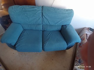 Sofá de tela verde