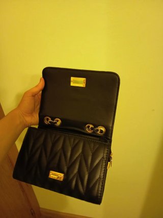 Bolso fiesta acolchado negro y dorado
