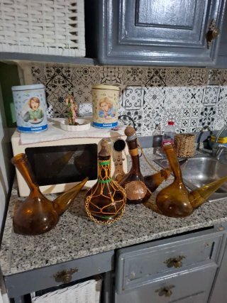 4 Porrones de cristal ámbar vintage