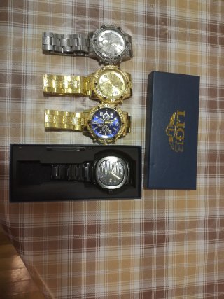 Lote de 4 Relojes de Hombre 1 LIGE los otros ZHOWE