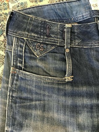Jeans con risvolti