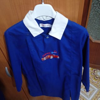 Grembiule blu marca Ambrosino per bambino di 7 ann