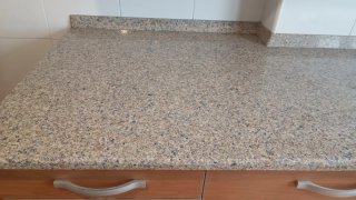 Cocina completa de madera y terracota