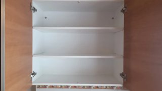 Cocina completa de madera y terracota