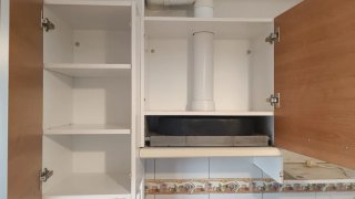 Cocina completa de madera y terracota