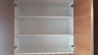 Cocina completa de madera y terracota