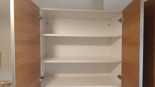 Cocina completa de madera y terracota