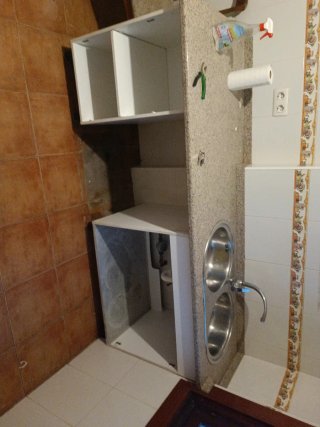 Cocina completa de madera y terracota
