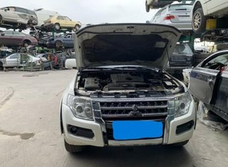 Mitsubishi 10087873 faro izq montero v80 v90 61864