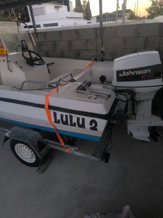 Barco con Motor Johnson 60