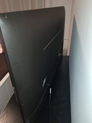 Mesa de estudio negra y television  lg de 60 pulga