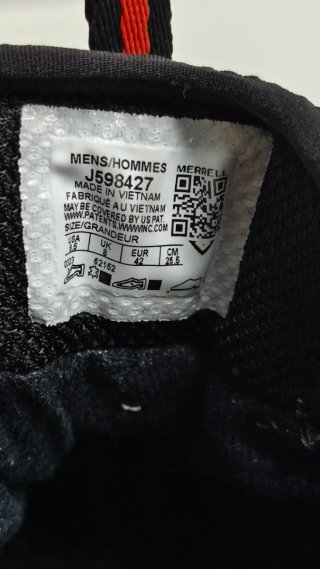 Botas de senderismo Merrell grises y naranjas