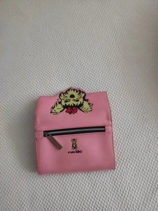 Cartera rosa con perro