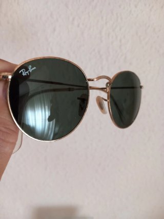 Gafas de sol Ray-Ban redondas doradas
