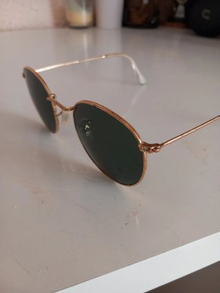 Gafas de sol Ray-Ban redondas doradas