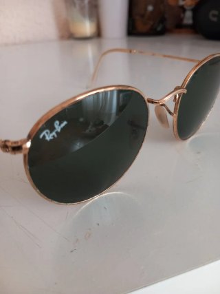 Gafas de sol Ray-Ban redondas doradas