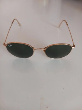 Gafas de sol Ray-Ban redondas doradas
