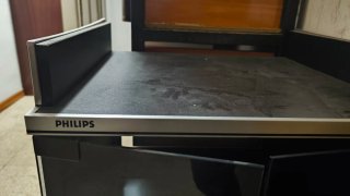Mueble diseñado para tocadiscos y vinilos.