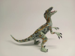Figura articulada de dinosaurio Velociraptor