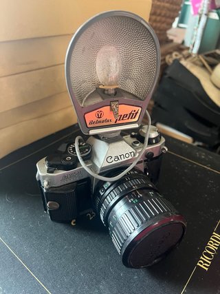 Canon AE-1 Program + Obiettivo 35-70mm + Flash