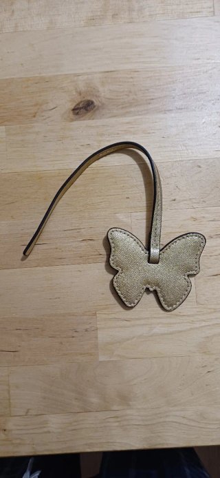 Michael Kors Accesorio Mariposa Dorado