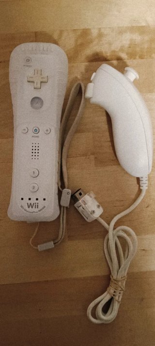 Nintendo Wii + Mando Motion Plus + Nunchuk + Juego