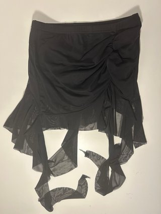Falda corta negra con pantalón integrado