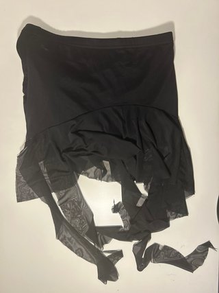 Falda corta negra con pantalón integrado