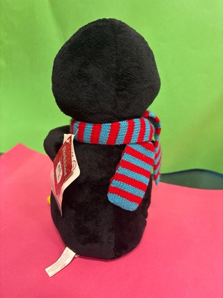 Peluches musicales burro y pingüino