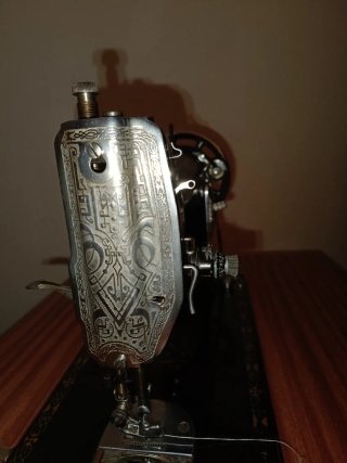 Máquina de coser Sigma con mueble